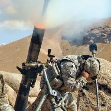 Low sensitivity mortar propelling charges being used by soldiers