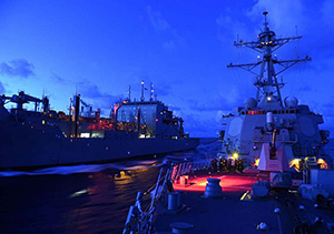 The Arleigh Burke-class guided-missile destroyer USS Lassen (DDG 82), right, receives fuel from the Military Sealift Command dry cargo and ammunition ship USNS Amelia Earhart (T-AKE 6) during an underway replenishment. Lassen is on patrol in the U.S. 7th Fleet area of responsibility in support of security and stability in the Indo-Asia-Pacific region. (U.S. Navy photo by Mass Communication Specialist 2nd Class Corey T. Jones/Released)