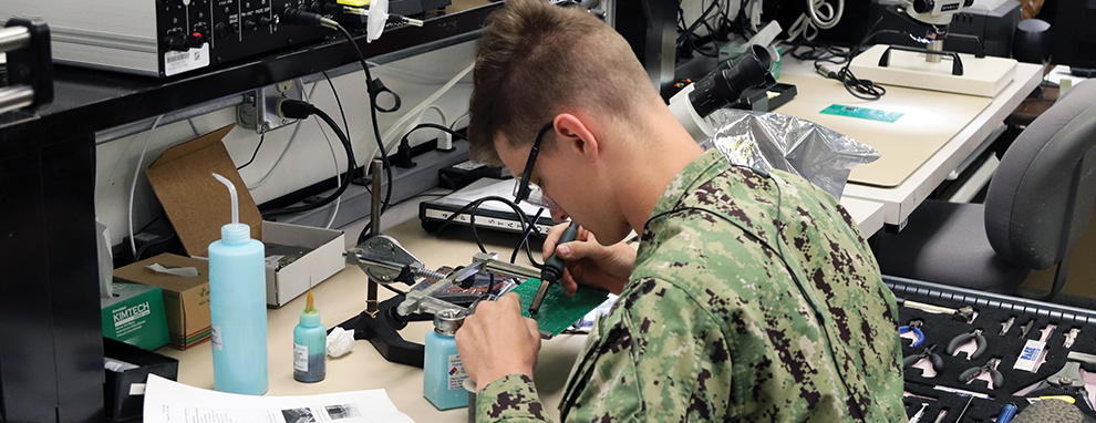 Sailor Performs an Assignment on a Circuit Card Assembly