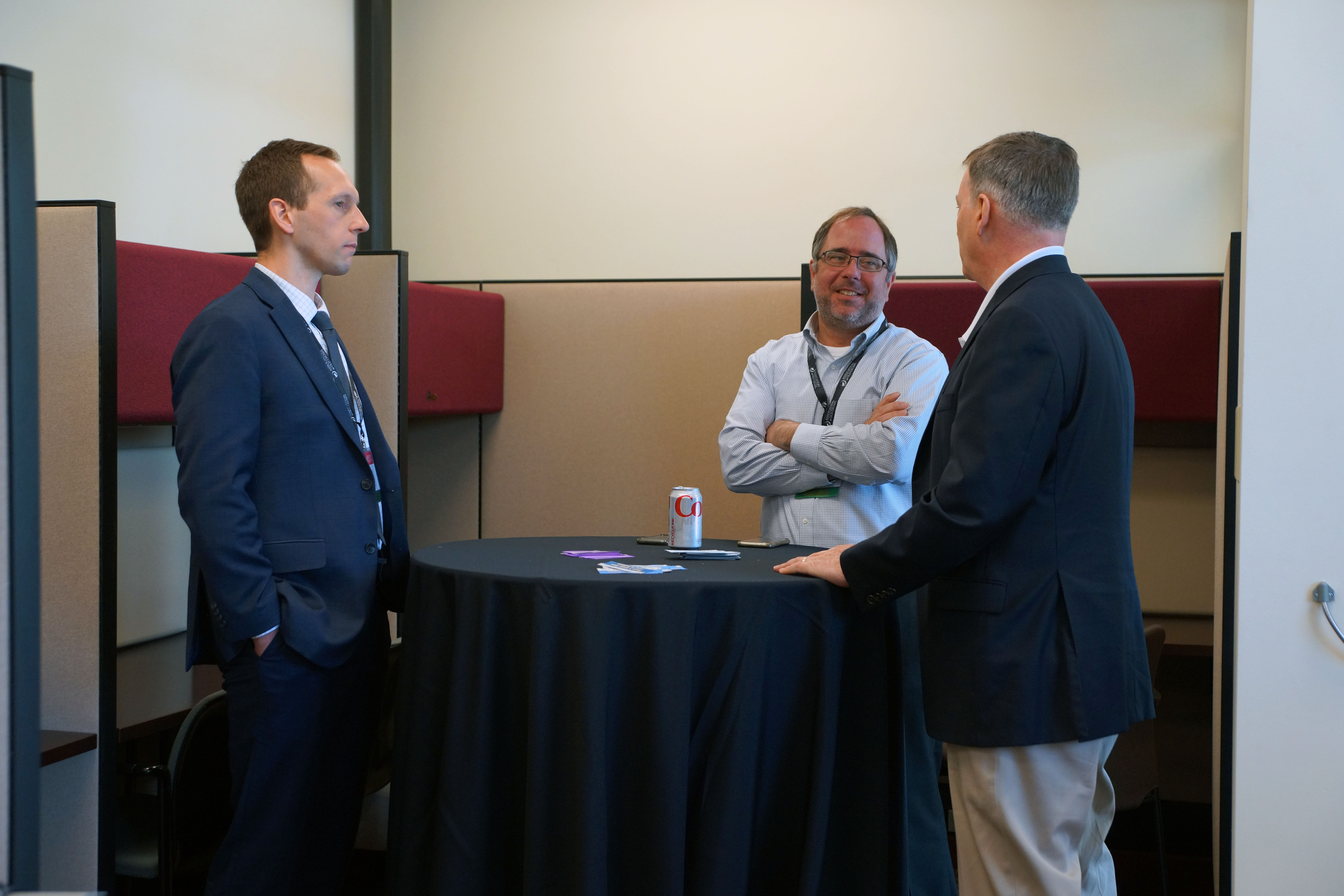 Figure 1: Conference participants engage in conversation. Figure 1: Conference participants engage in conversation.