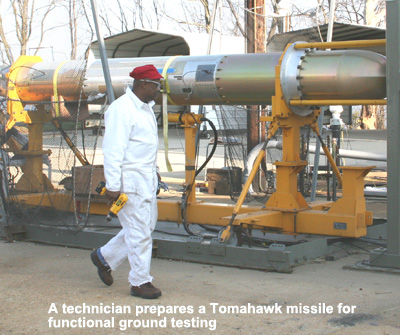 A technician prepares a Tomahawk missile for functional ground testing
