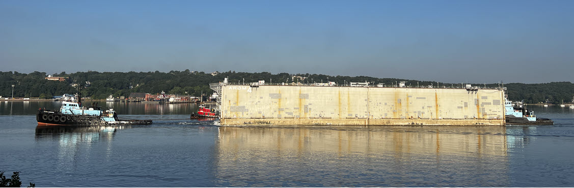 Shippingport being towed from New London