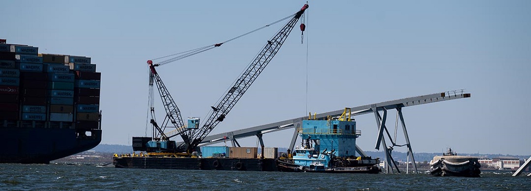 The Chesapeake, a 1000-ton lift capacity derrick barge, the Ferrell, a 200-ton lift capacity revolving crane barge, and the Oyster Bay, a 150-ton lift capacity crane barge are in Baltimore Harbor.
