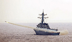 The guided-missile destroyer USS McCampbell (DDG 85) fires a drone during a test of the air defense systems of the aircraft carrier USS George Washington (CVN 73). George Washington is underway in the western Pacific Ocean from its permanently forward-deployed port at Commander, Fleet Activities Yokosuka for a combat operations efficiency evaluation. (U.S. Navy photo by Mass Communication Specialist 3rd Class Jared M. Hill/Released)