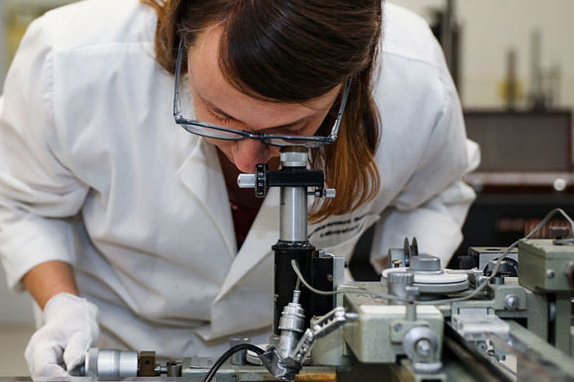 NSWC Corona intern inside the standards lab