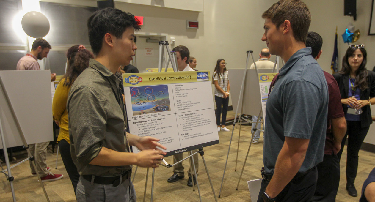 College students attend a tech expo College students attend a tech expo
