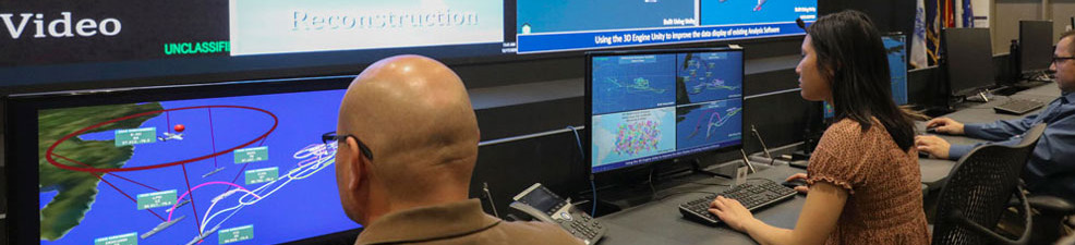 NSWC Corona personnel attend a brief inside the Joint Warfare Assessment Lab NSWC Corona personnel attend a brief inside the Joint Warfare Assessment Lab