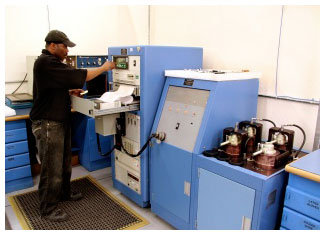 Keyport employee using the fuel valve and hydro test machine