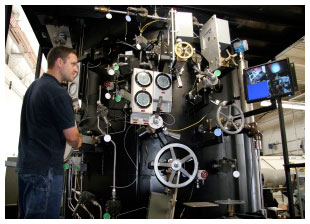 Keyport employee using the SSGN LOC trainer