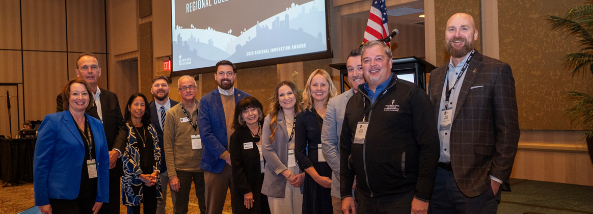 NSWC Crane Technology Transfer and Ivy Tech Community College teams photographed at the Regional Opportunity Initiatives Awards.